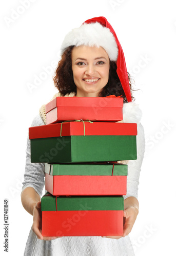 Happy woman holding Christm...