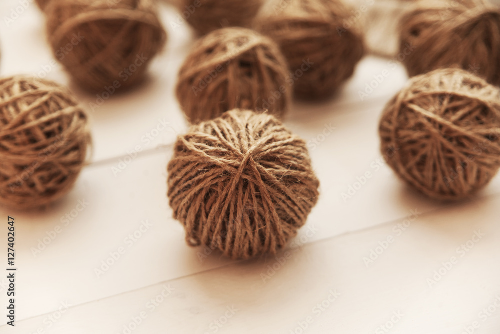 yarns for knitting on a wooden table yarns for knitting on a wooden table