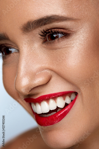 Beauty Fashion Woman Face With Perfect White Smile  Red Lips