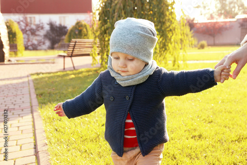 Cute little baby in green p...