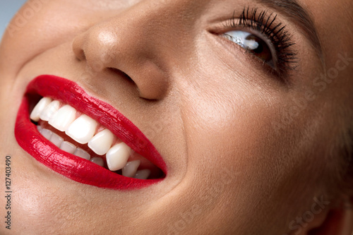 Beauty Fashion Woman Face With Perfect White Smile  Red Lips