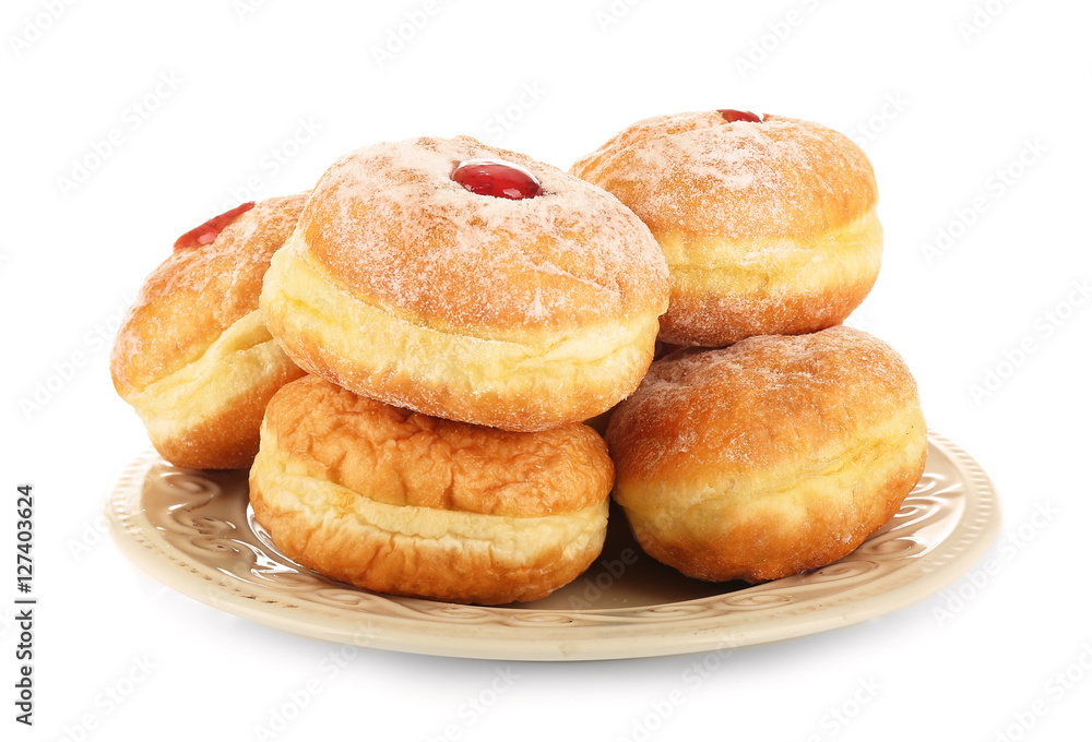 Plate with tasty donuts on white background. Hanukkah celebration concept