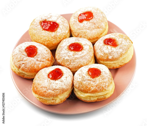 Plate with tasty donuts on white background. Hanukkah celebration concept