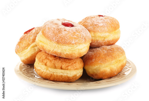 Plate with tasty donuts on white background. Hanukkah celebration concept