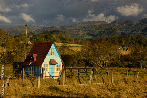 Little house in the countryside of Colombia photo