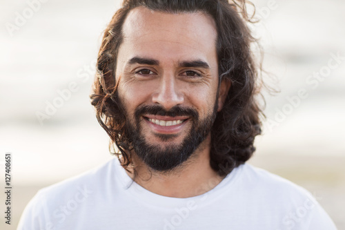 close up of happy smiling middle aged man face