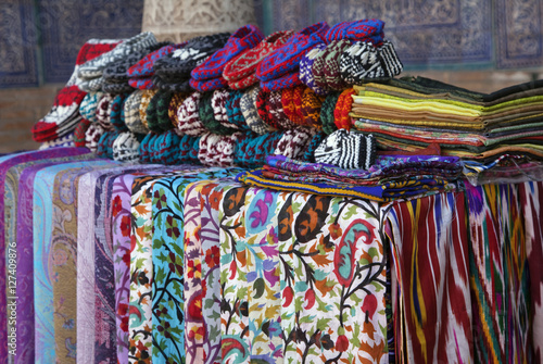 Scarves and knitted slippers in a street market, Uzbekistan