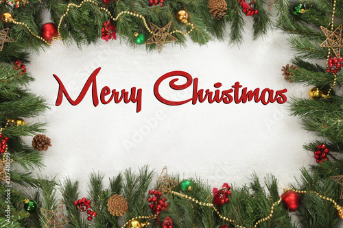 Merry Christmas on decorative festive background photo