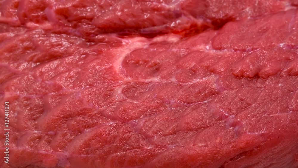 Rotating beef meat at white isolated background Rotating beef meat at white isolated background
