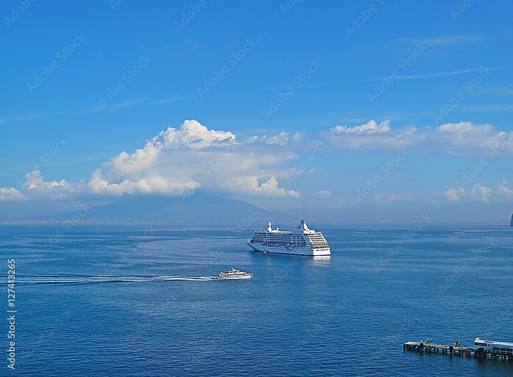 Beautiful landscape with the sea. Cruise ship in the sea near the shore. Sorrento, Italy