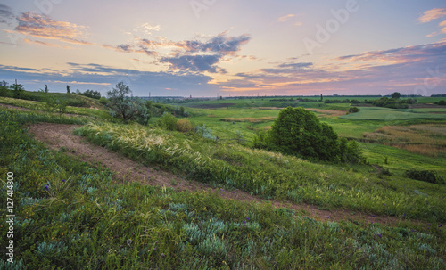 Sunrise in Ukrainian steppe. The National Park Dvurechanskiy ,