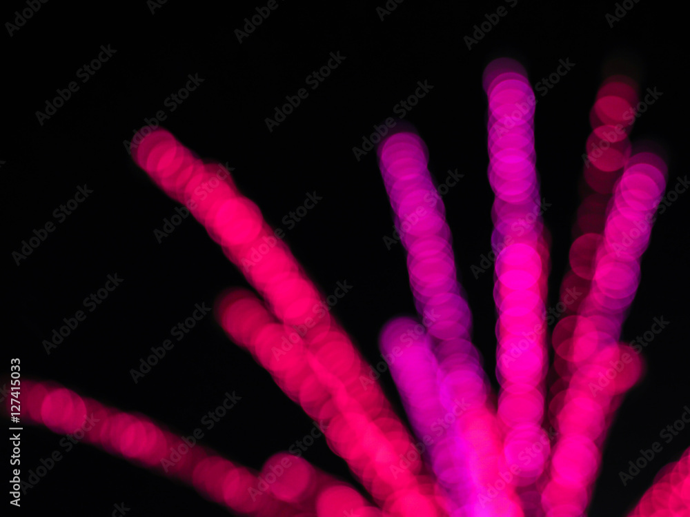Red and pink light bokeh background in the night. Red and pink light bokeh background in the night.