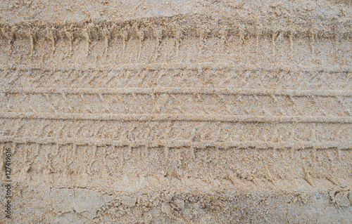 Texture of tire form car or truck on sand and beach.