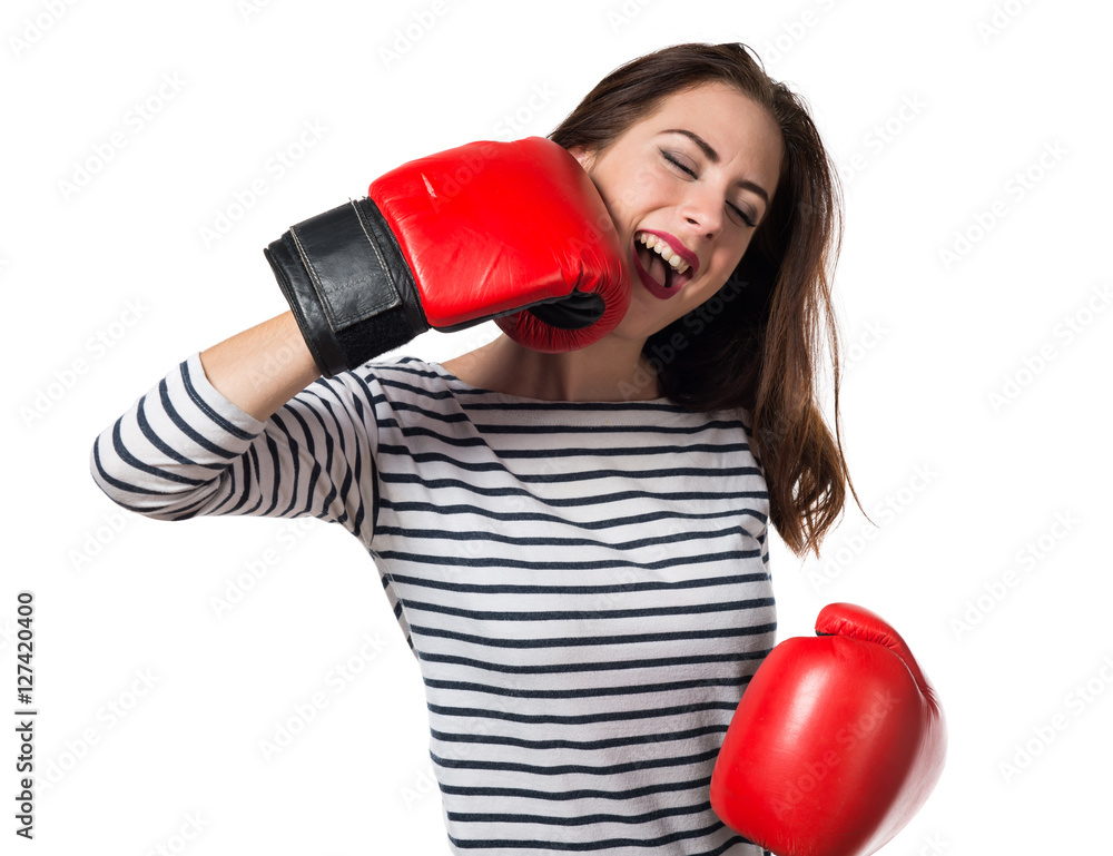 Pretty young girl with boxing gloves Pretty young girl with boxing gloves