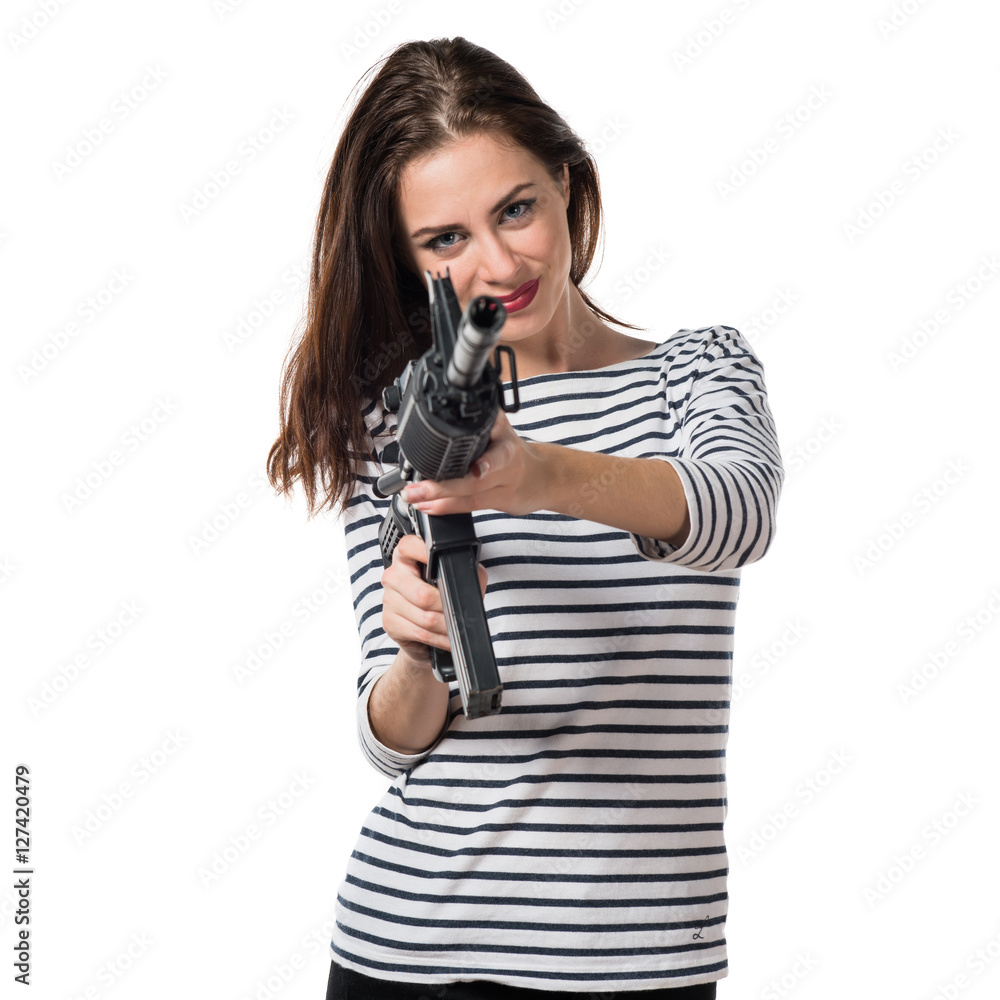Pretty young girl holding a pistol Pretty young girl holding a pistol