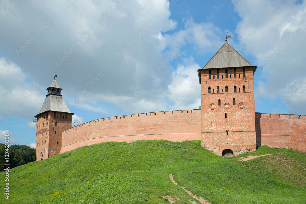 Two towers of the Kremlin of Veliky Novgorod in the July afternoon. Russia