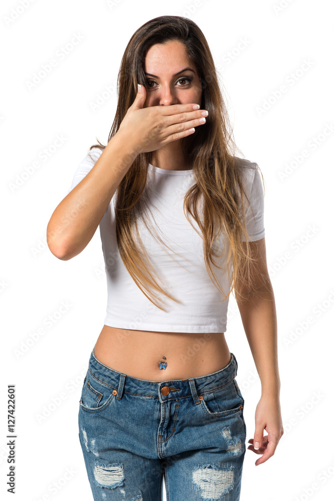 Young pretty girl covering her mouth Young pretty girl covering her mouth