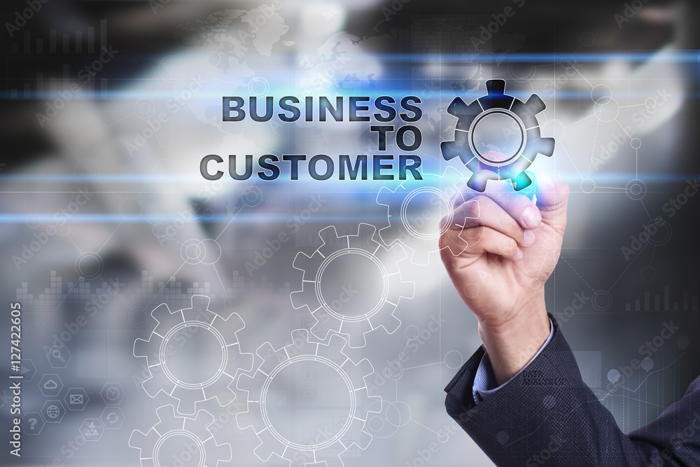 Businessman is drawing on virtual screen. business to customer concept Businessman is drawing on virtual screen. business to customer concept