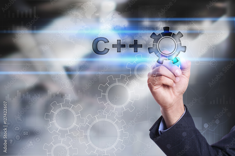 Businessman is drawing on virtual screen. c++ concept Businessman is drawing on virtual screen. c++ concept