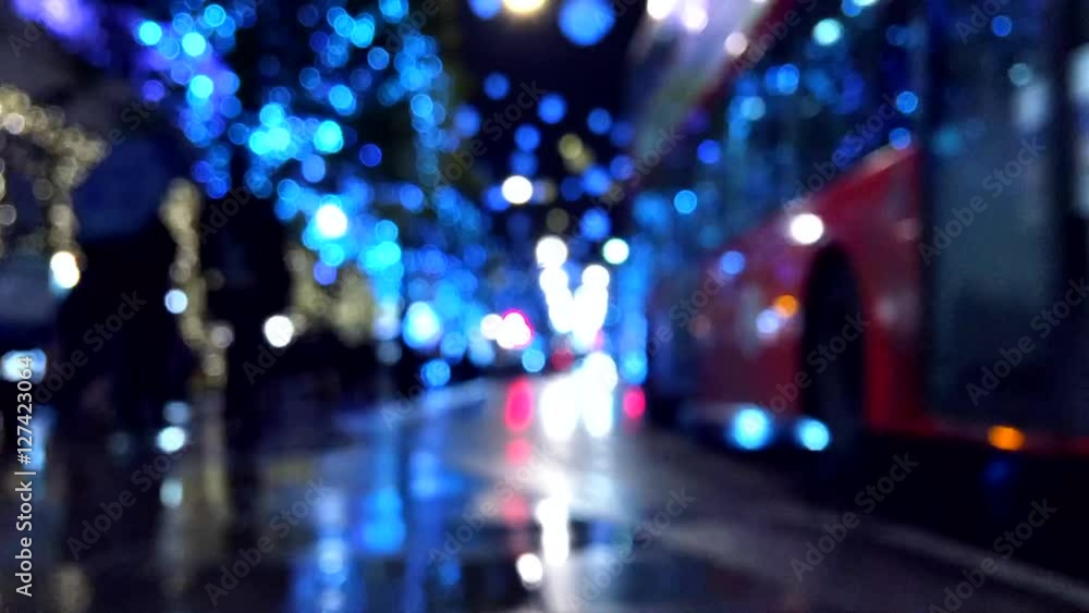 Abstract night view of holiday lights and city traffic on the streets of London in time-lapse Abstract night view of holiday lights and city traffic on the streets of London in time-lapse