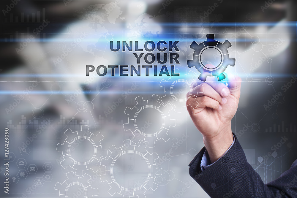 Businessman is drawing on virtual screen. unlock your potential concept Businessman is drawing on virtual screen. unlock your potential concept