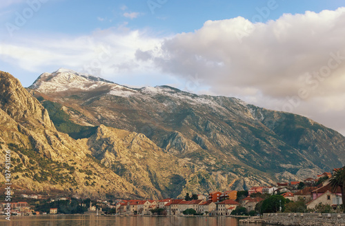 Winter Montenegro. View Lovcen mountain from Bay of Kotor and Prcanj town