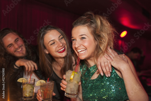 Friends hanging out at a nightclub