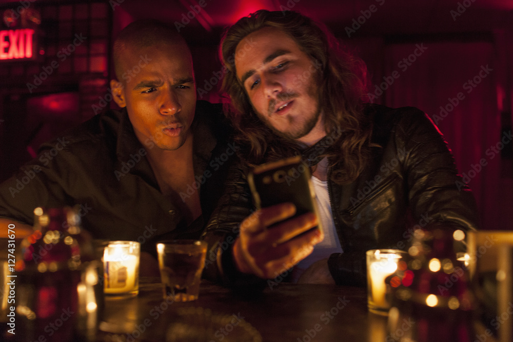 Young men hanging out at a nightclub Young men hanging out at a nightclub