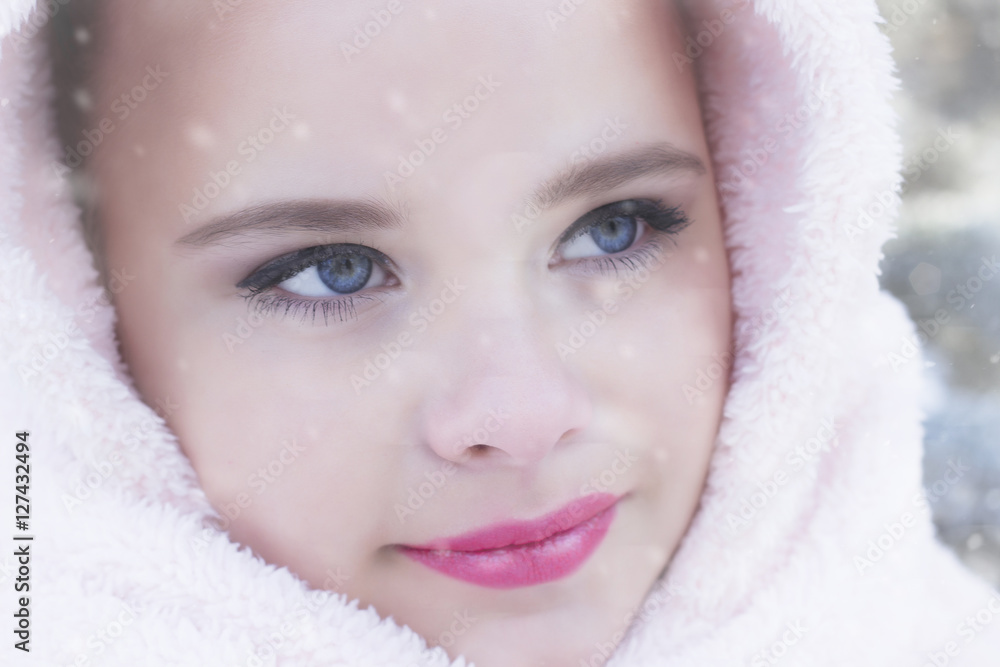 Winter portrait of adorable happy child girl