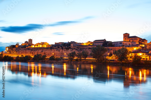 Zamora skyline at sunset by Duero river Spain