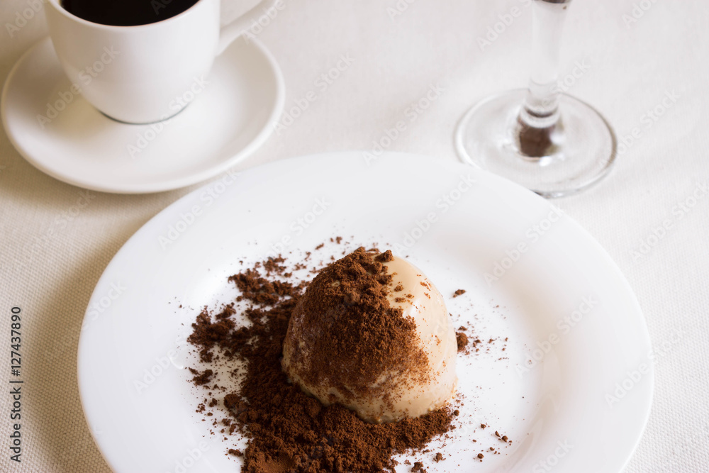 Panna cotta topped with grated chocolate Panna cotta topped with grated chocolate