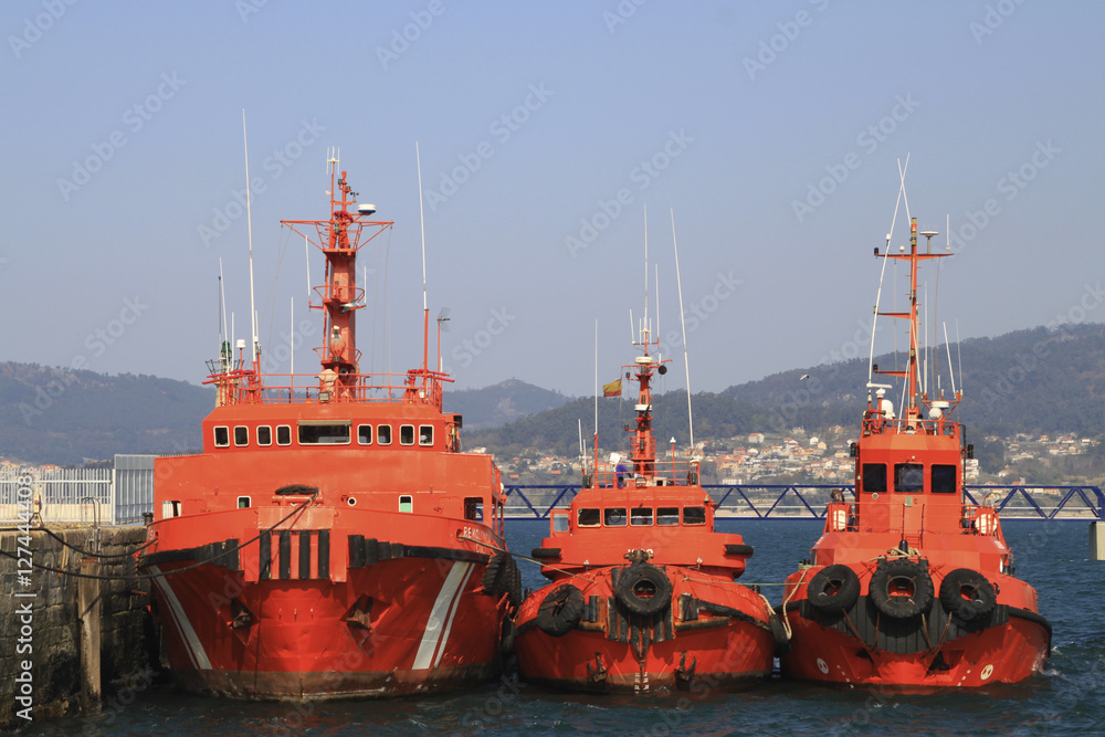 Fototapeta premium three tugboats in the port