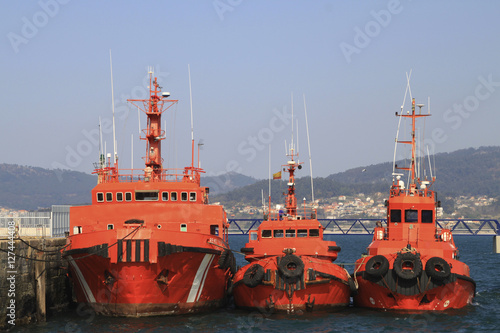 three tugboats in the port