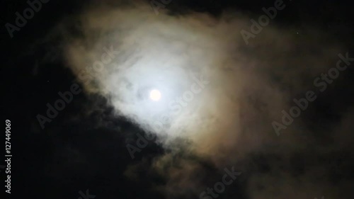 Full moon behid clouds medidative photo