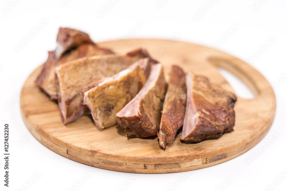 Obraz premium Smoked ribs on the wooden board