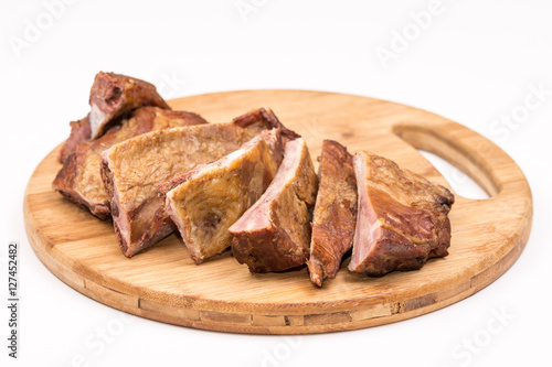 Raw smoked ribs isolated over white background