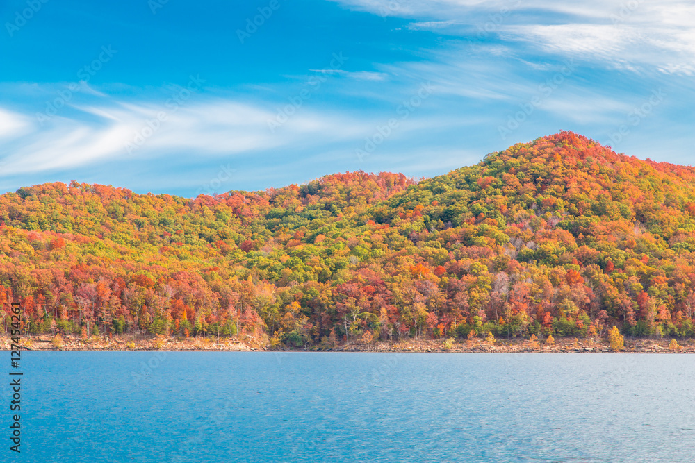 Autumn season at lake with beautiful forest at hill shore. Autumn season at lake with beautiful forest at hill shore.