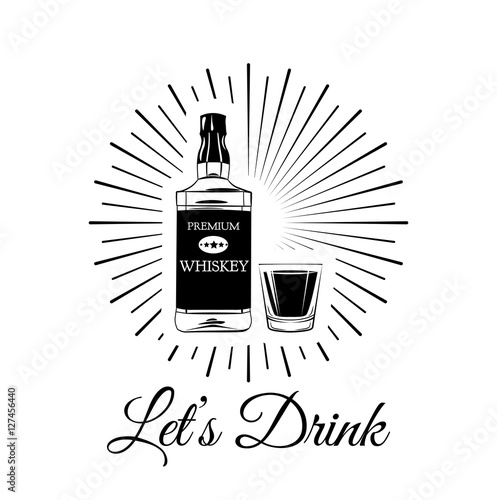 bottle of whiskey and a glass of whiskey
