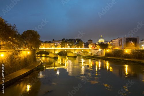 Wonderful River Tiber and the ancient bridges in Rome - romantic view in the evening