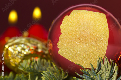 Red bauble with the golden shape of Arizona.(series)