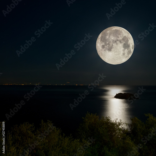 Full Moon and moonlight on night sea