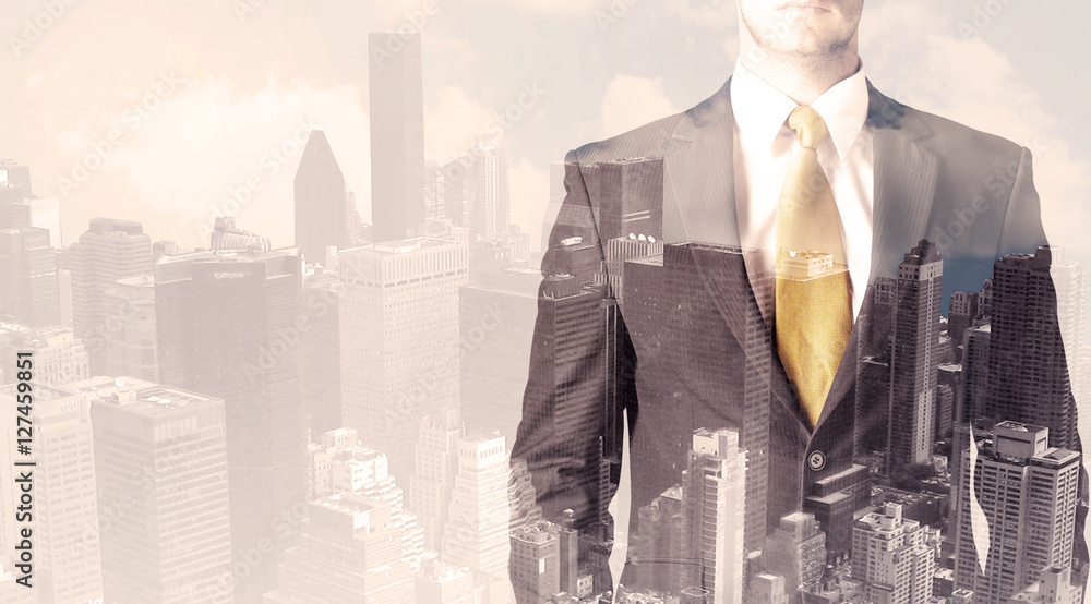 Handsome business man with overlay cityscape Handsome business man with overlay cityscape