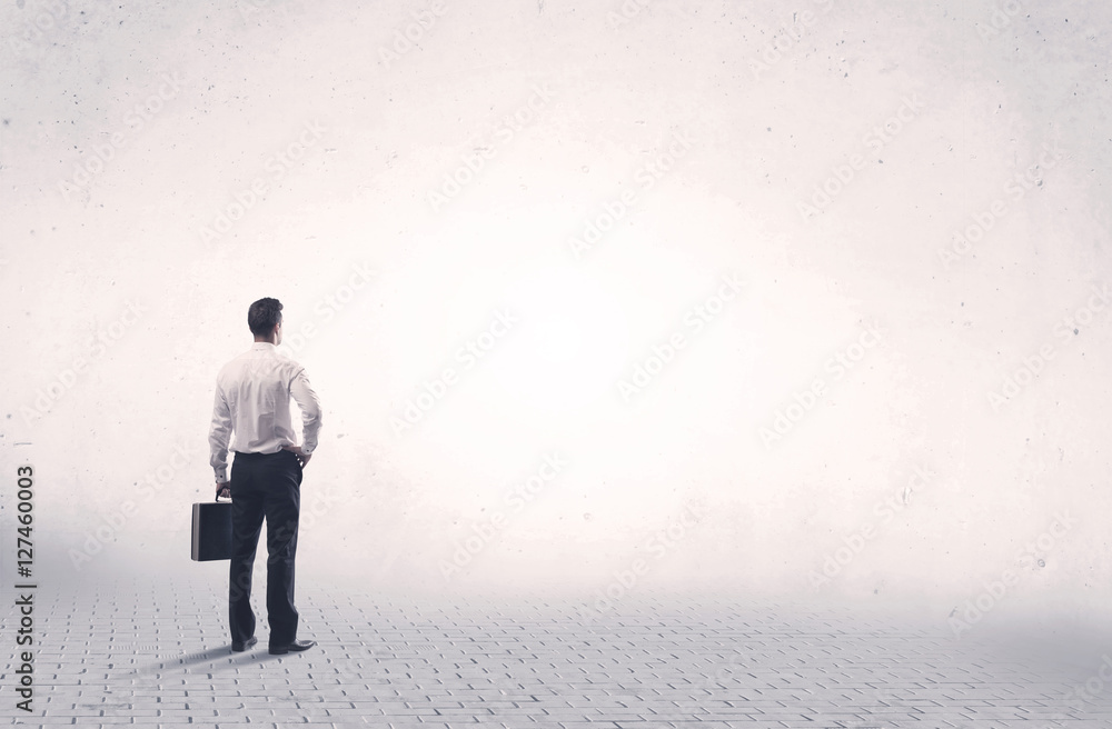 Elegant person standing with his back Elegant person standing with his back