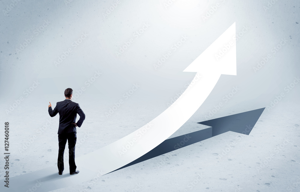 Arrow pointing up with standing salesman Arrow pointing up with standing salesman