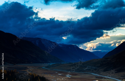 Altay. Mountains. Golden autumn. Blue sky.