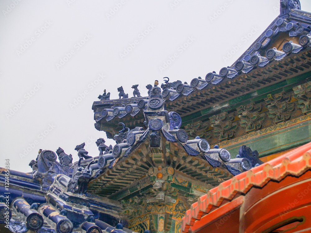 Chinese roofs at Forbidden city Beijing Symbols of guardian power and luck at colorful asian decoration