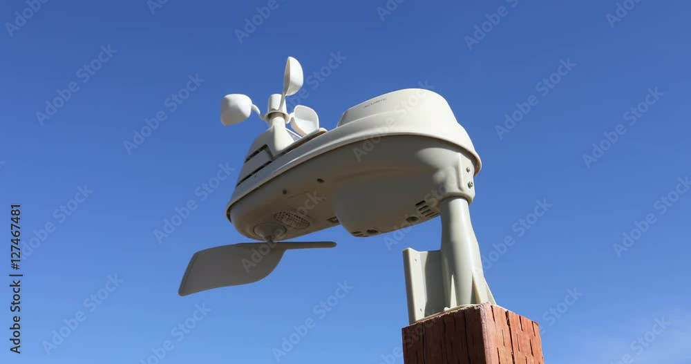 Home weather station wind meter spinning. Remote automatic facility with instruments and equipment for observing atmospheric conditions to provide information for weather forecasts.