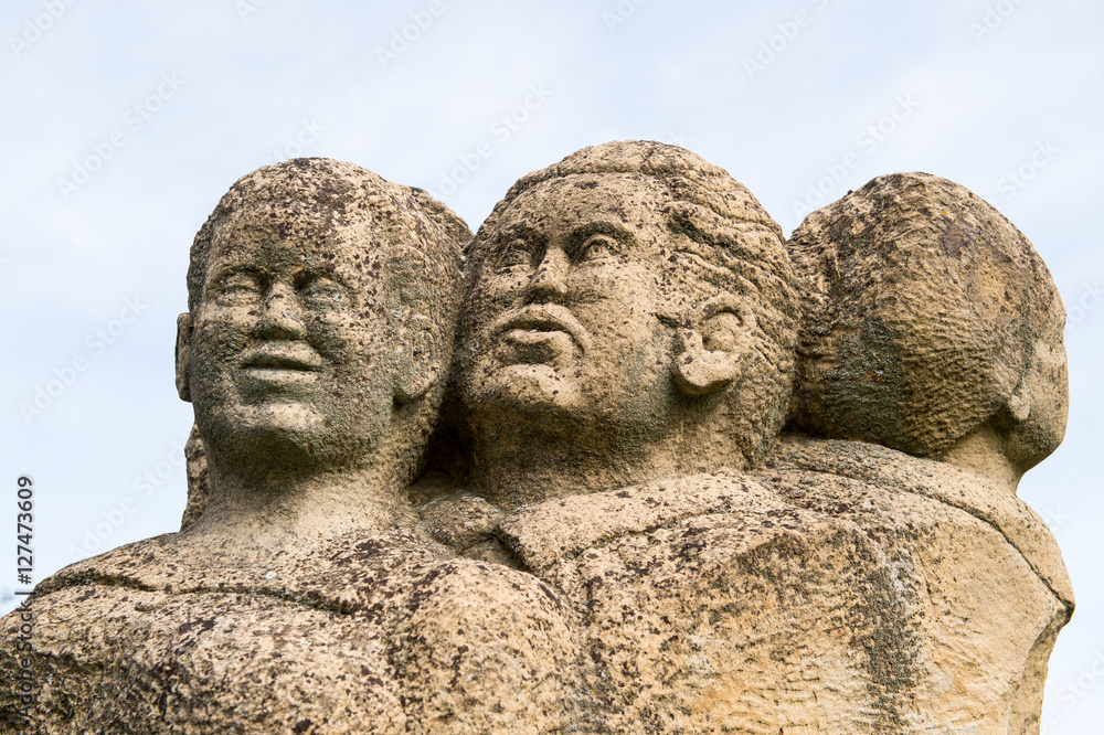 Fototapeta premium Old statues in the destroyed village