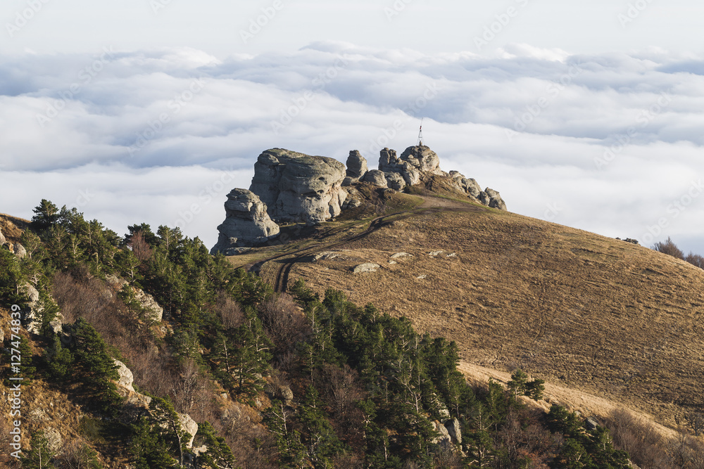 Mountain hills shrouded in low clouds, top of Demerdji in Crimea