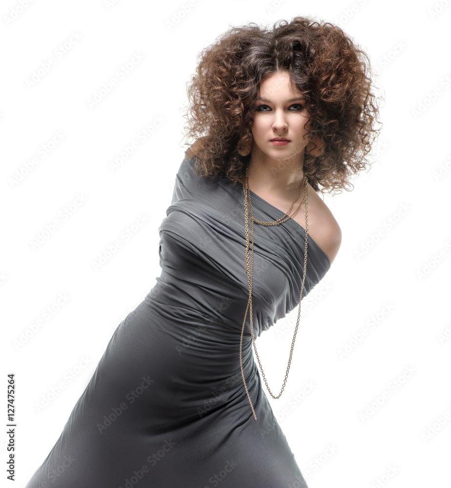 Naklejka premium Brunette girl with a curly hairstyle and carnivore look with her hands tied
